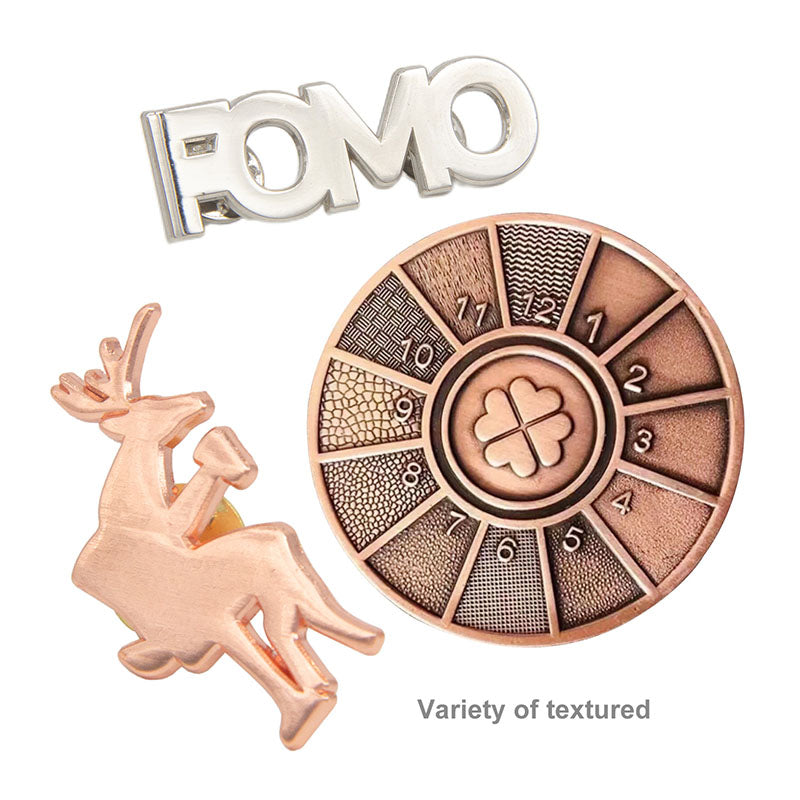 Custom die struck pin with no enamel; antique metal finish; deep relief; classic look.