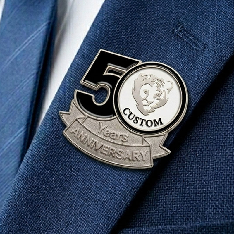 50th anniversary lapel pin on a blue suit jacket