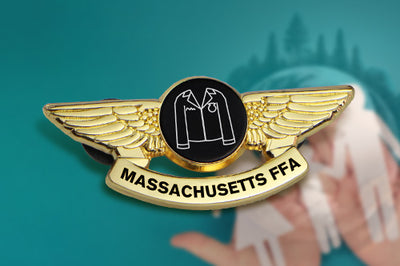 Custom Pilot Wings Pin Gold With 3D Sculpted Wings and Centered Black and White FFA Jacket Emblem Featuring Custom 'MASSACHUSETTS FFA' Text for FFA Chapter Achievement and Recognition