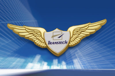 Custom Pilot Wings Pin Gold In Construction Engineering Corporate Identity Case With Prominent 3D Relief Featuring Custom TRANSTECH Logo