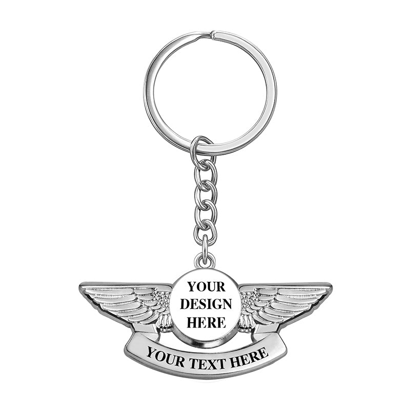 silver 3D pilot wings keychain with raised emblem design