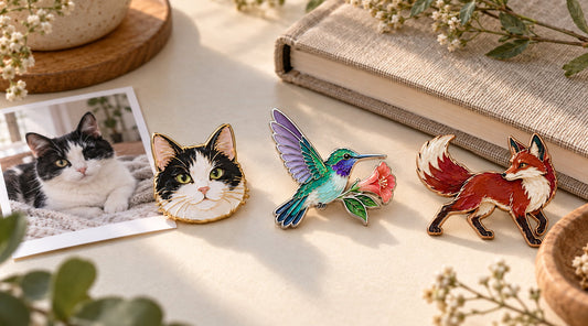 Illustrative cat, bird, and fox pins beside a pet photograph and nature journal.