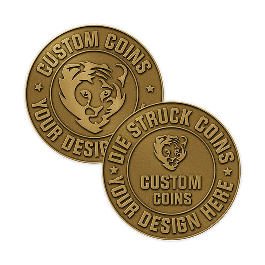 Custom die struck coins in metal with embossed tiger head design and stars, featuring custom text, stacked on white background.
