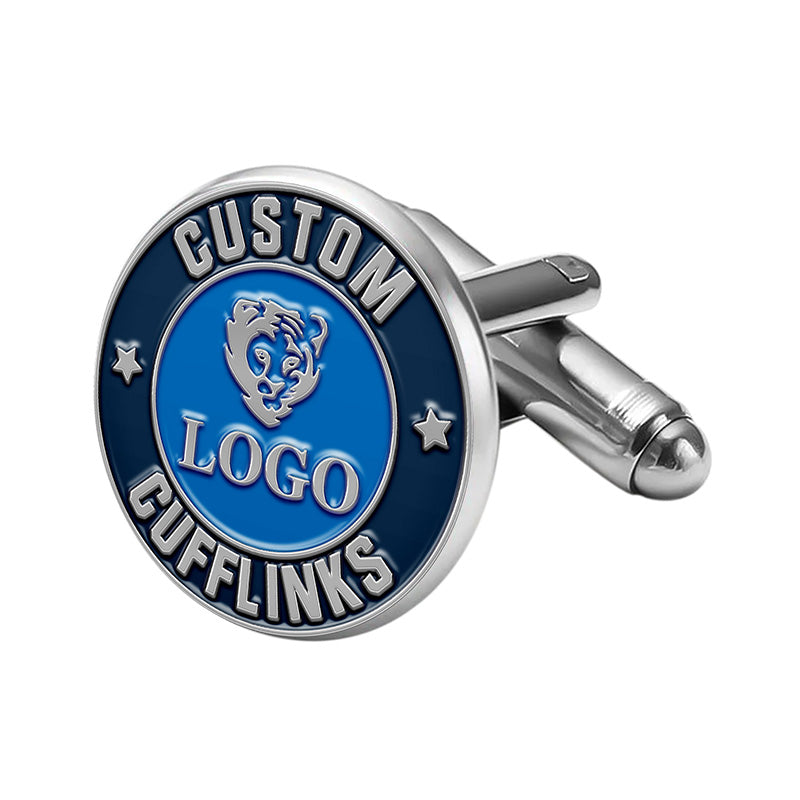 Custom round cufflinks in dark blue enamel with silver accents, featuring a central emblem design, inscribed text, and space for custom personalization.