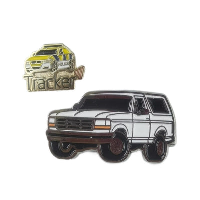 A collection of custom pins featuring different car designs.
