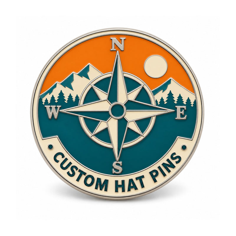 Compass and mountain custom hat pin in teal and orange enamel on white