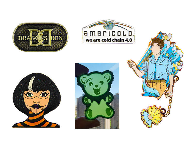 Custom Memorial Pins In Soft Enamel With Stained Glass Effects Epoxy Coating And Dangler Attachments Showcasing Five Distinct Designs: Gold Letter Pin With DRAGONS DEN Text Black Haired Portrait Pin Green Bear Shape Pin Paintbrush Figure With Shell Dangler And americolo we are cold chain 4.0 Text Pin
