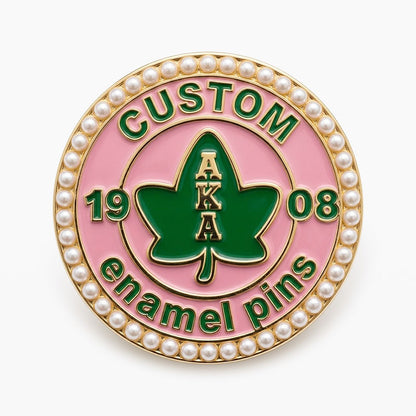 Custom round AKA pin featuring a green ivy leaf center and a pearl border.