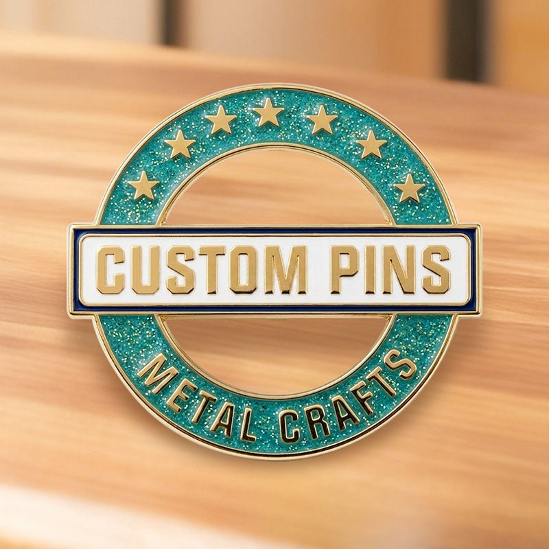 Custom enamel pins with glitter featuring Gold plating and a round cutout design with stars