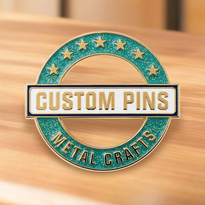 Custom enamel pins with glitter featuring Gold plating and a round cutout design with stars