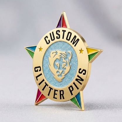 Custom enamel pins with glitter featuring Gold plating with a light blue sparkling star center and multi-color tips