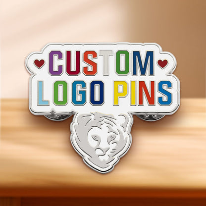 Custom hard enamel pins in Silver plating featuring colorful text layout and a lion emblem