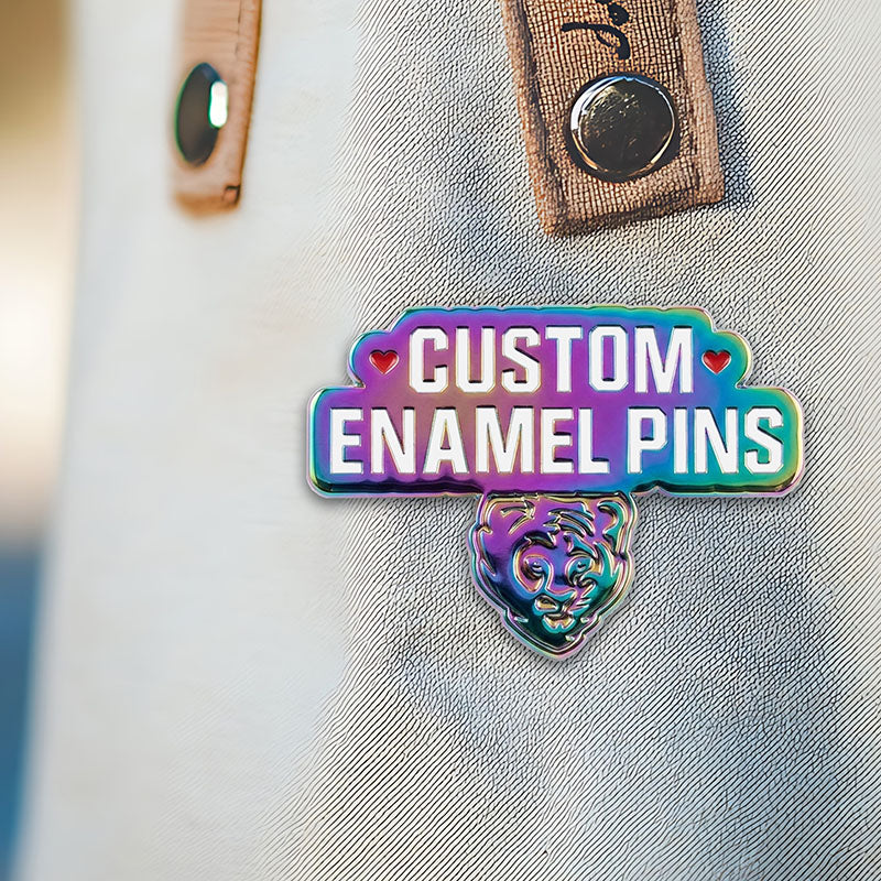 Custom soft enamel pin in Rainbow finish pinned onto a white tote bag for premium styling