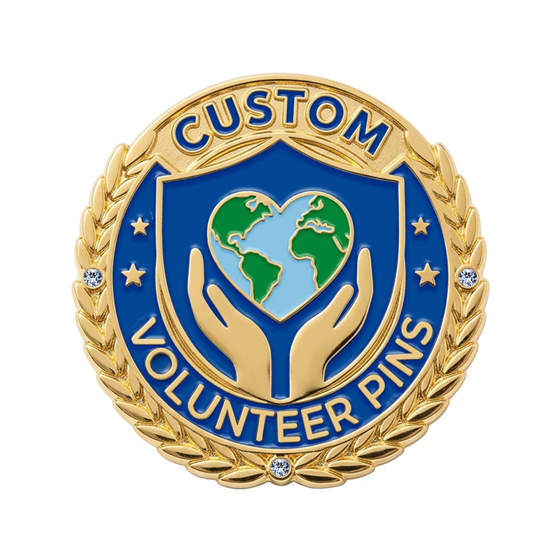 A custom round volunteer appreciation lapel pin in gold tone, featuring a blue enamel shield with supportive hands holding a heart-shaped earth globe
