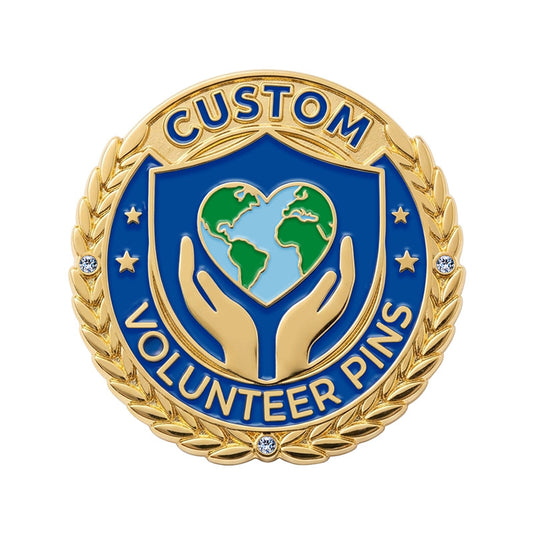 A custom round volunteer appreciation lapel pin in gold tone, featuring a blue enamel shield with supportive hands holding a heart-shaped earth globe