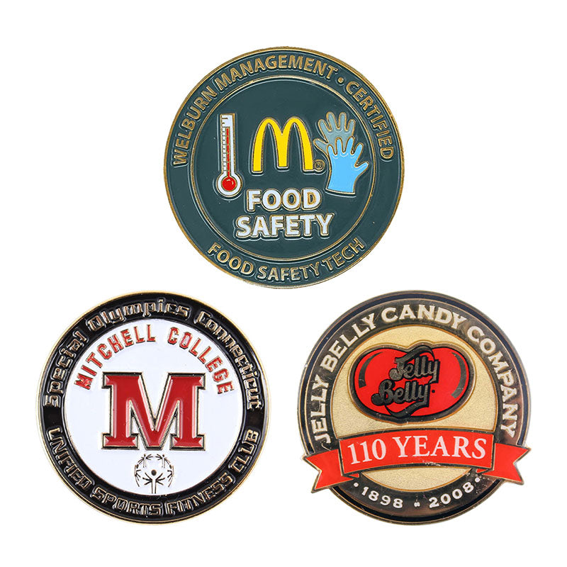 A collection of corporate logo pins highlighting various options such as custom text ribbons for service years, departmental certification, and organizational programs.