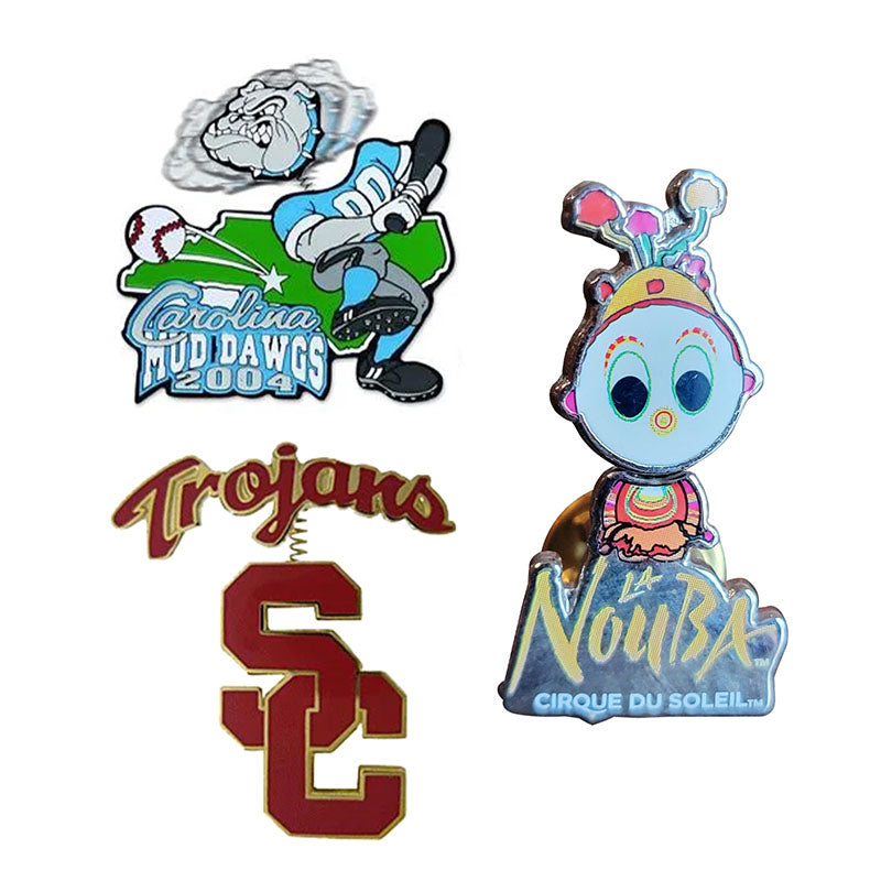 Custom enamel lapel pin display series featuring a sports team pin with a Spring bobble head, a character-themed cartoon pin, and a sports-themed mascot pin.