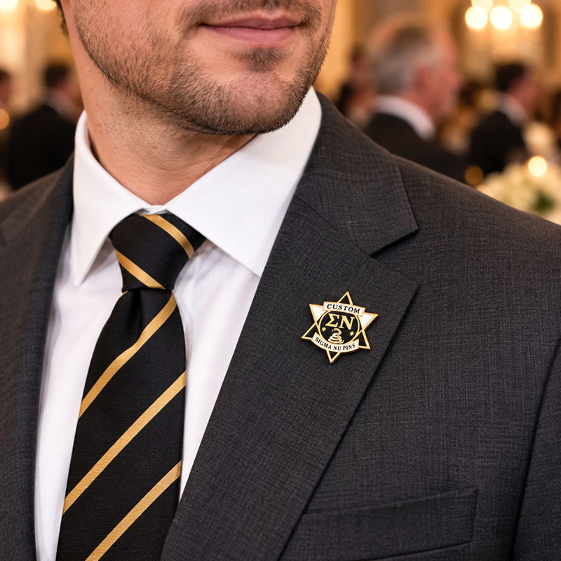 Custom Sigma Nu pin worn on formal attire in a fraternity event setting