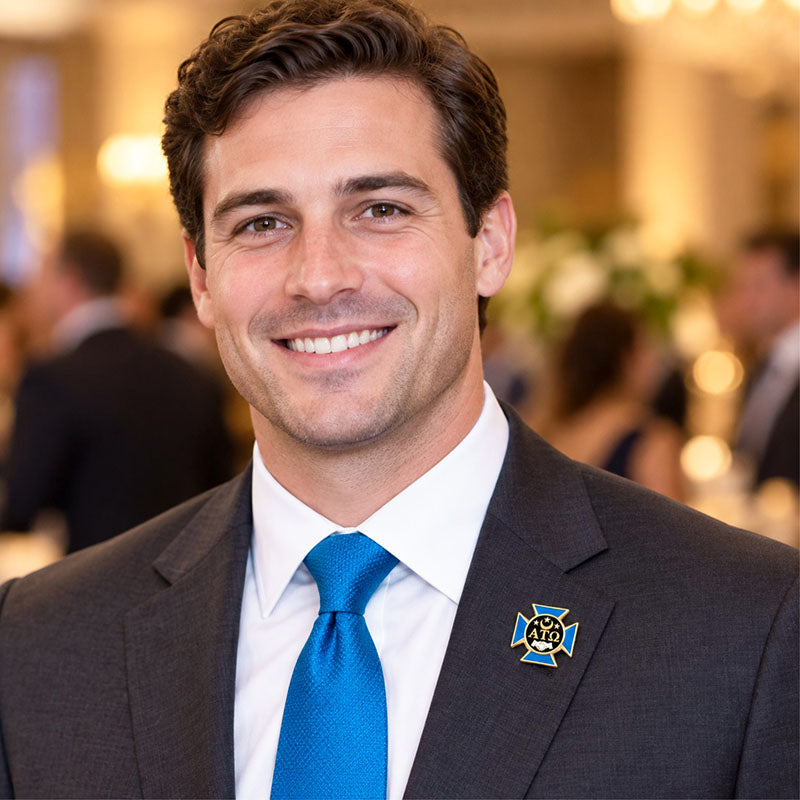 Custom Alpha Tau Omega pin worn on formal attire in a fraternity event setting