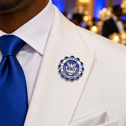 Custom Phi Beta Sigma pin worn on formal attire in a fraternity event setting