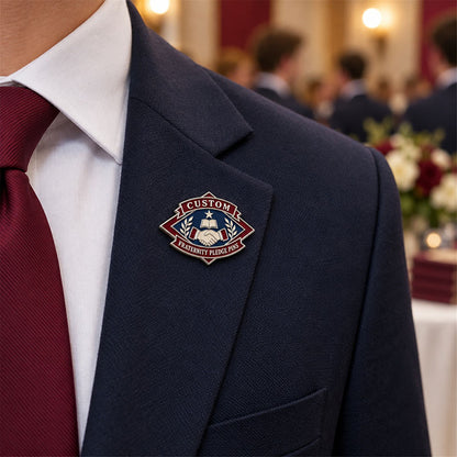 Custom fraternity pledge pin worn on formal attire in a fraternity event setting