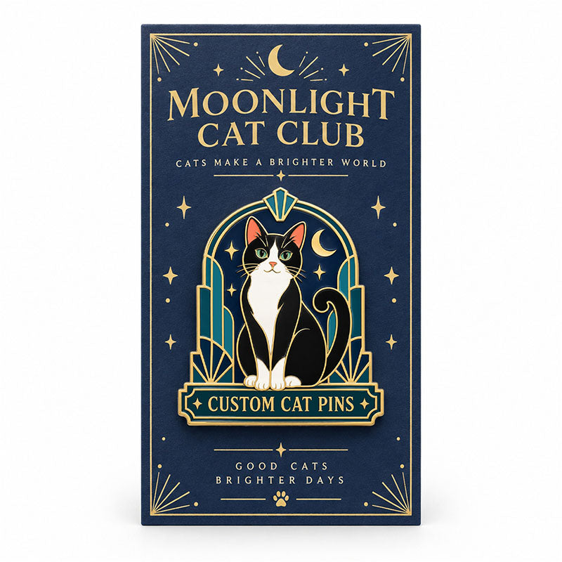 Black and white cat enamel pin displayed on a navy Moonlight Cat Club backing card