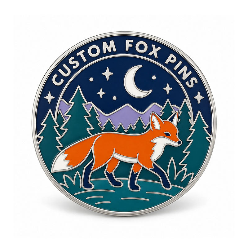 Round silver fox pin with an orange fox beneath a crescent moon in a forest landscape