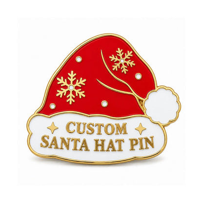 Gold Santa hat pin with red enamel, snowflakes, white trim, and custom lettering