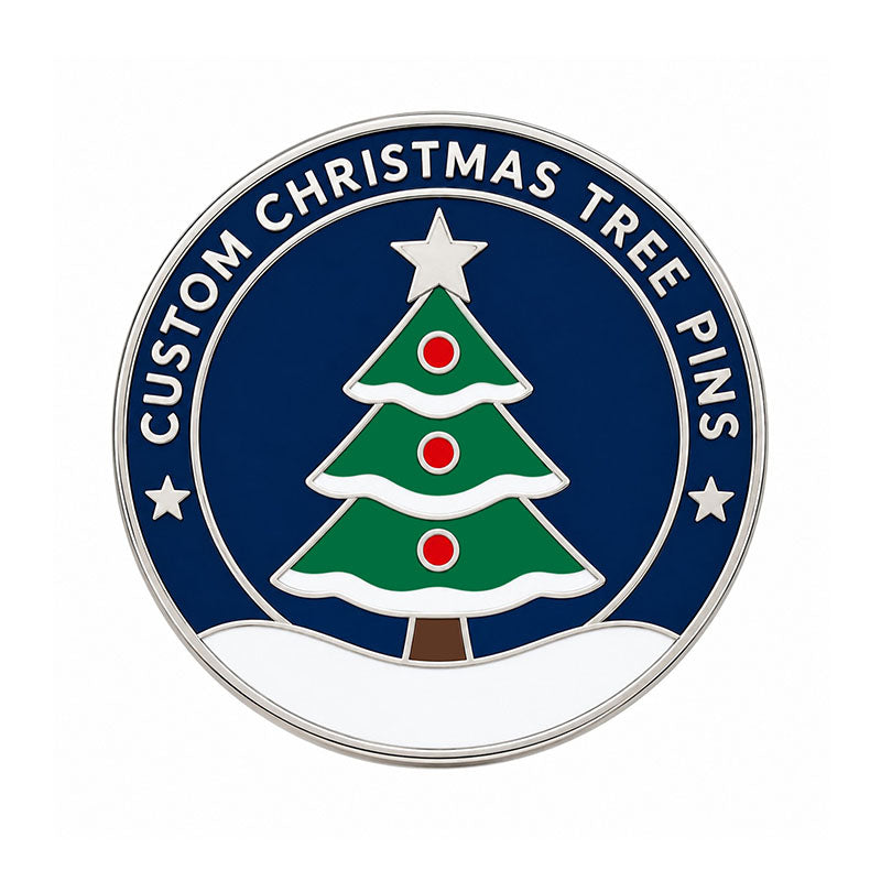 Round silver Christmas tree pin with green branches, red ornaments, and a navy border