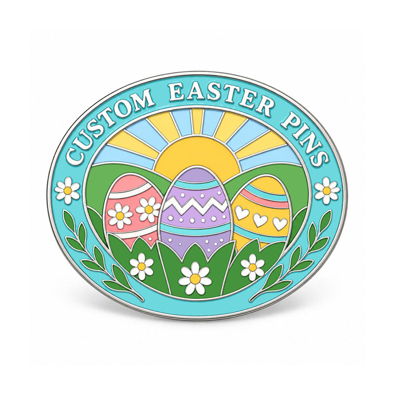 Round silver Easter pin with three patterned eggs, daisies, green hills, and sunrise