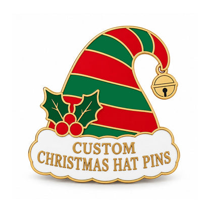 Gold Christmas hat pin with red and green stripes, holly, white trim, and a hanging bell