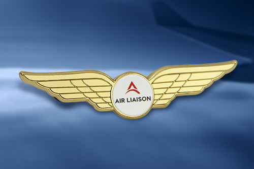 Custom Pilot Wings Pin Gold With 3D Dimensional Wings And Custom AIR LIAISON Text In Aviation Industry Recognition Case