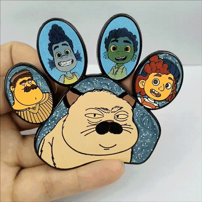 Custom lenticular enamel pin shaped like a cat paw, featuring a shifting multi-image design that displays different animated characters.