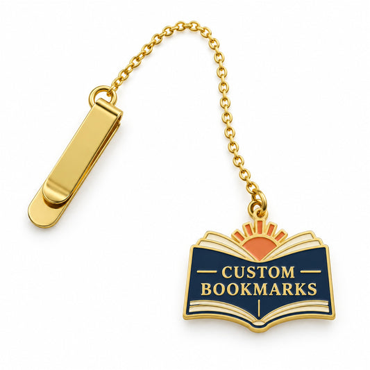 Gold custom bookmark with chain, page clip, and navy enamel open-book charm