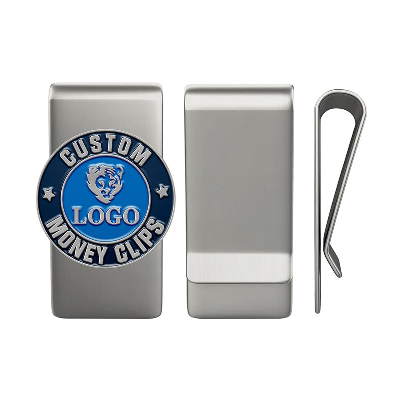 Display of custom money clips in silver with multiple views: front featuring a blue enamel emblem with custom text, back showing smooth surface, and clip detail.