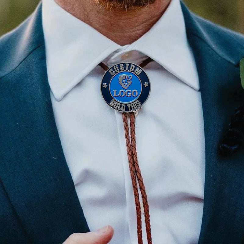Custom bolo tie in a close-up scene, worn with a suit for a professional look, featuring engraved custom text and elegant design.