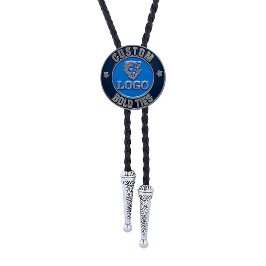 Custom silver bolo tie with dark braided cord, circular emblem featuring blue enamel, animal head design, star accents, and space for custom text and logo.
