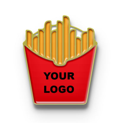A metal pin with a design of crispy fries in a red container with a placeholder for a custom logo.