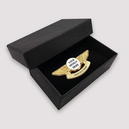 Gold Pilot Wings Lapel Pin with Customizable Text Displayed in an Open Black Gift Box with Velvet Lining — Perfect for Aviation Enthusiasts, Graduation Ceremonies, or Corporate Recognition Awards