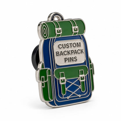 Side view of backpack pins showing polished metal thickness, enamel details, and secure pin backing